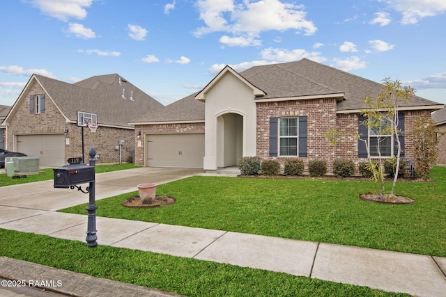 view of front facade with a garage and a front yard