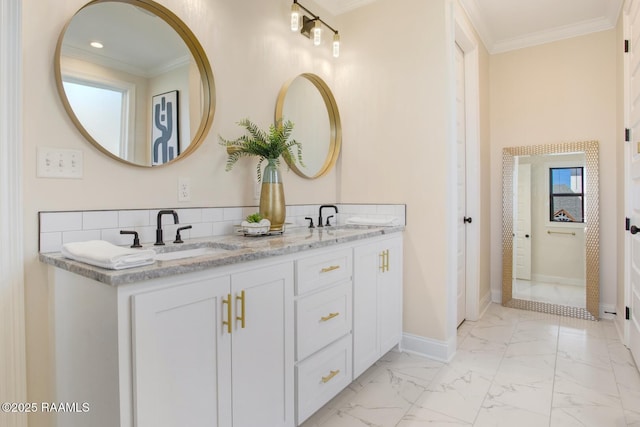 bathroom with vanity and ornamental molding