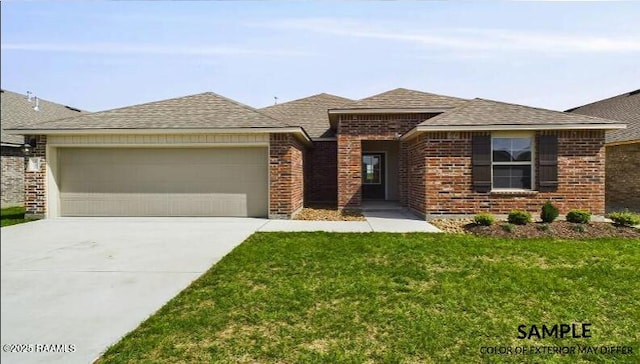 view of front of property featuring a garage and a front lawn