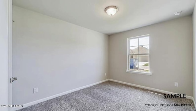 empty room with carpet flooring