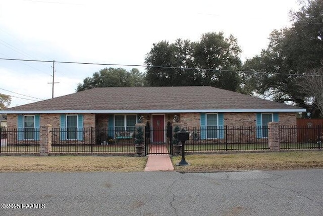 1401 Gregg Ave, Eunice, LA 70535 - ranch-style house with brick siding and a fenced front yard