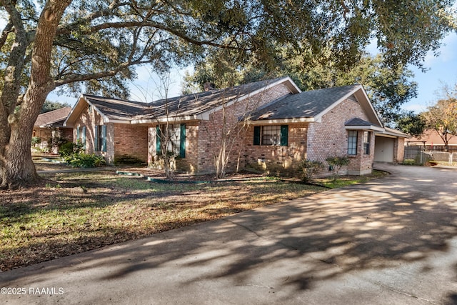 ranch-style home with a garage