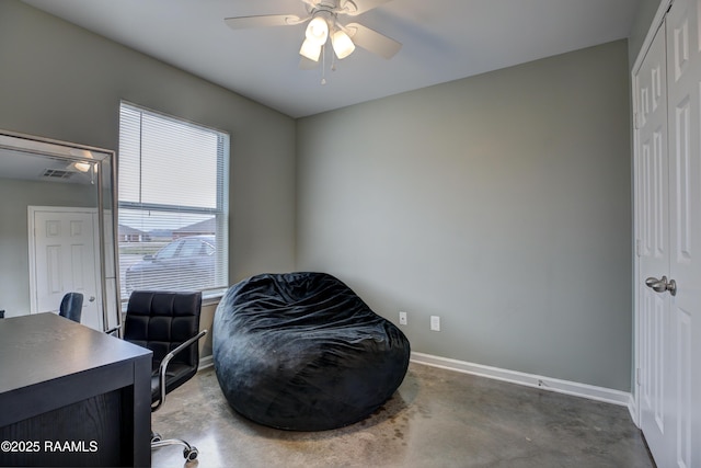 office featuring concrete flooring and ceiling fan