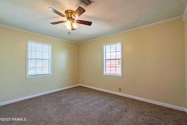 empty room featuring ornamental molding, carpet flooring, a textured ceiling, and ceiling fan