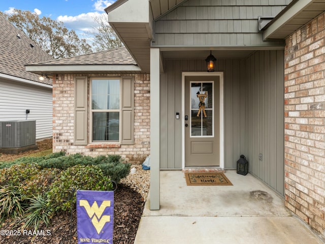 doorway to property with central air condition unit