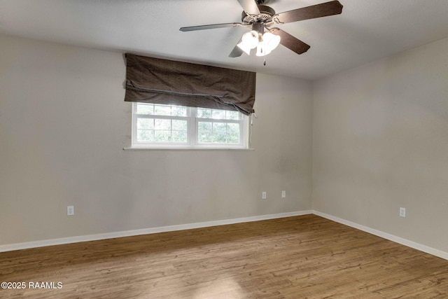 unfurnished room with ceiling fan and light hardwood / wood-style floors