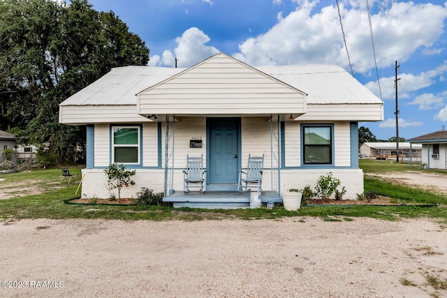 bungalow-style home featuring covered porch