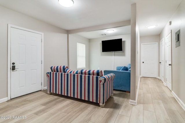 living room with light hardwood / wood-style floors