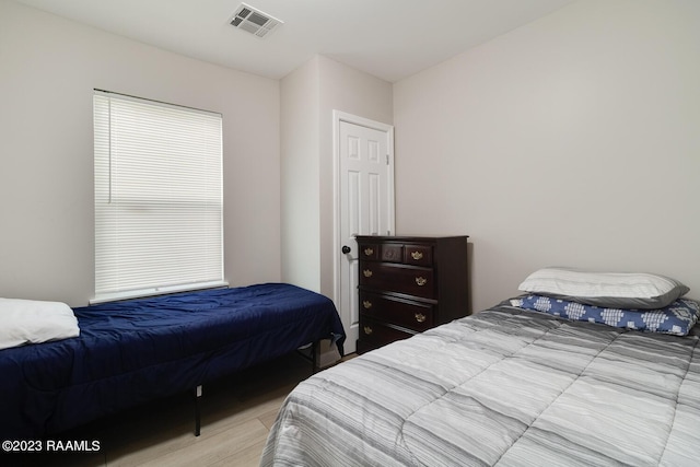 bedroom featuring light hardwood / wood-style floors