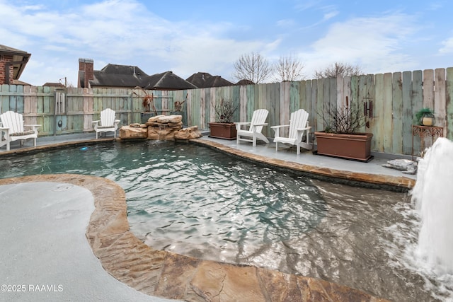 view of pool with a patio area