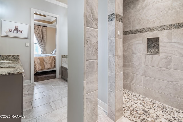 bathroom with walk in shower, ornamental molding, and vanity