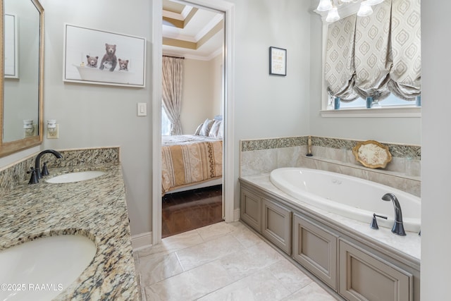 bathroom featuring tile patterned floors, a tub to relax in, ornamental molding, a tray ceiling, and vanity