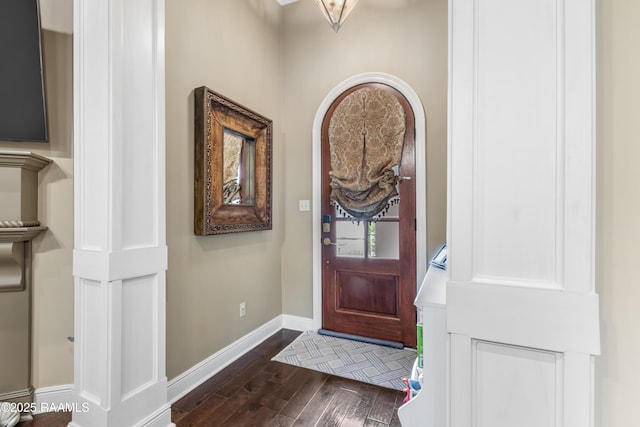 entryway featuring dark wood-type flooring