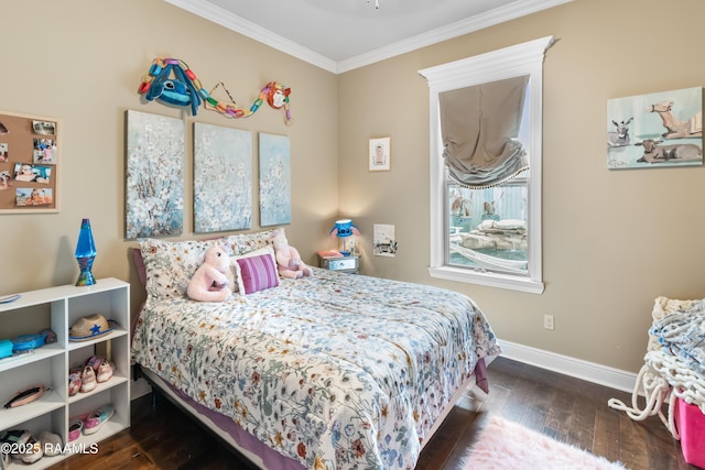 bedroom with crown molding and dark hardwood / wood-style flooring