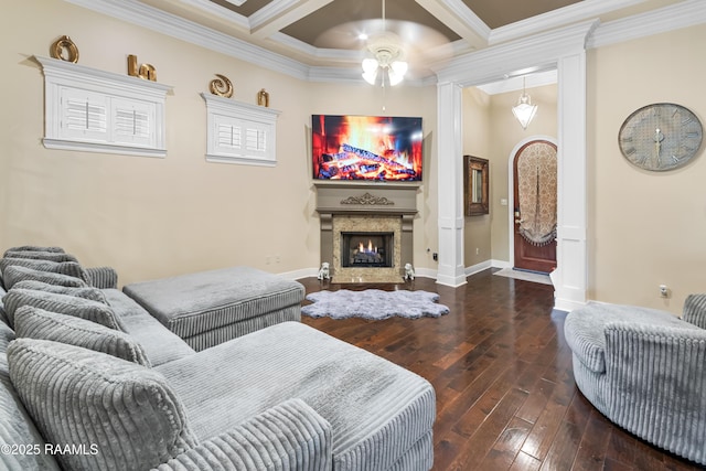 living room featuring crown molding, wood-type flooring, coffered ceiling, and beamed ceiling