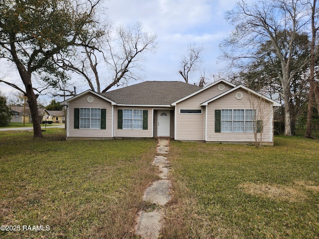 ranch-style house with a front yard