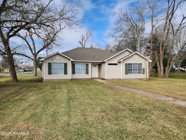 single story home with a front yard