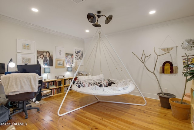 bedroom featuring crown molding and wood-type flooring