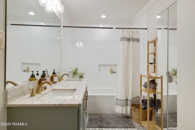 bathroom featuring crown molding, vanity, and shower / bath combination with curtain