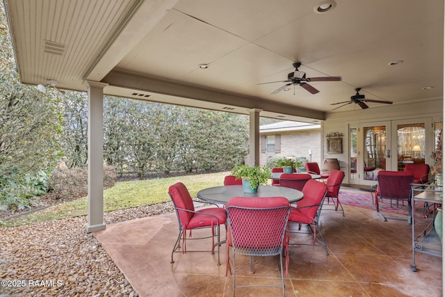 view of patio / terrace featuring french doors and ceiling fan