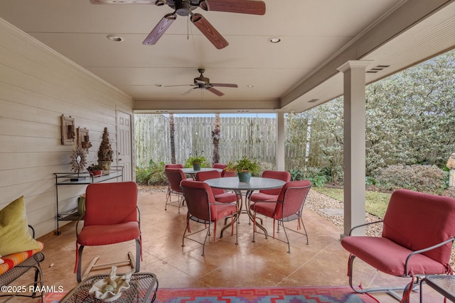 view of patio / terrace featuring ceiling fan