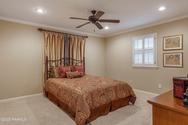 carpeted bedroom featuring ornamental molding and ceiling fan