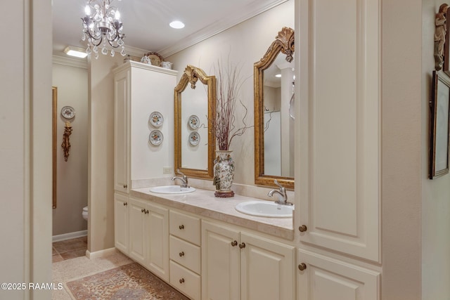 bathroom featuring ornamental molding, toilet, and vanity