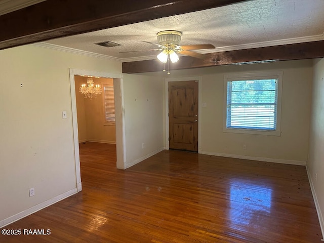 spare room with hardwood / wood-style flooring, ornamental molding, and ceiling fan with notable chandelier