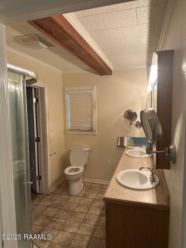 bathroom featuring ornamental molding, vanity, and toilet