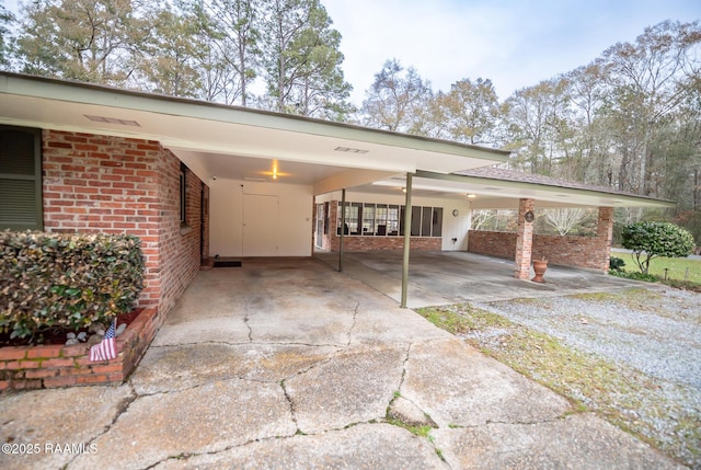 view of parking featuring a carport