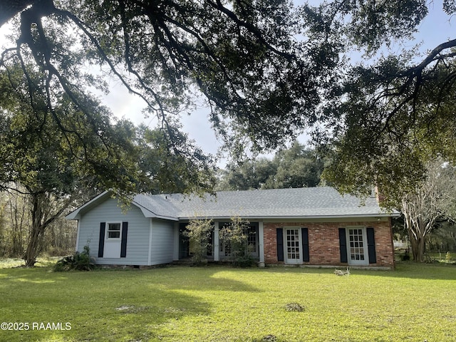 ranch-style house with a front yard