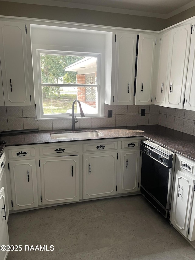 kitchen with white cabinetry, black dishwasher, sink, and backsplash