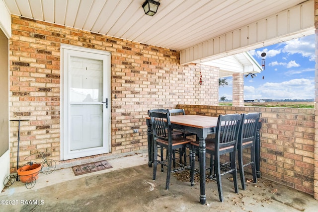 view of patio with a bar