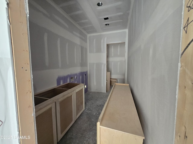 kitchen featuring light brown cabinetry