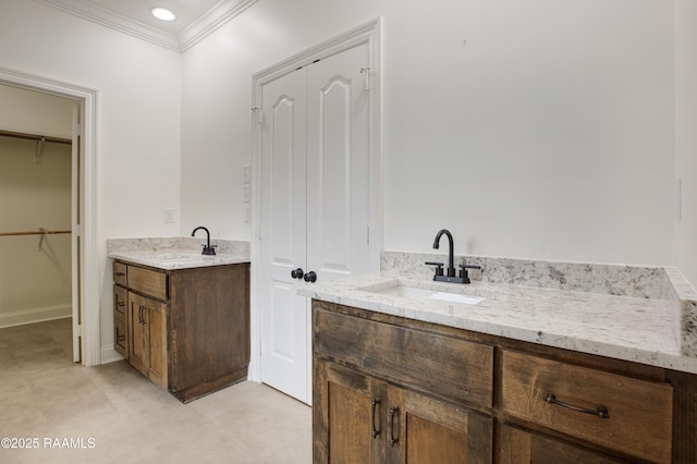 bathroom featuring vanity and crown molding