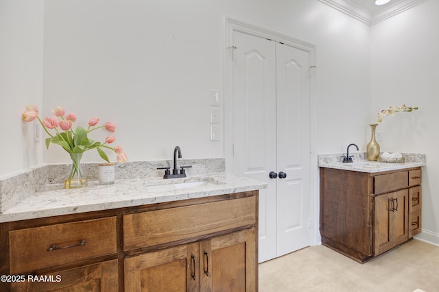 bathroom with vanity and crown molding