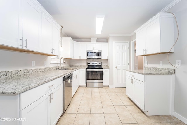 kitchen with crown molding, stainless steel appliances, sink, and white cabinets