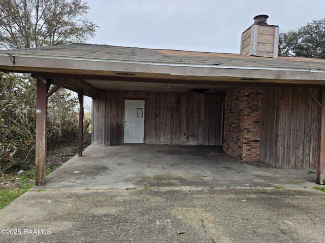 garage with a carport