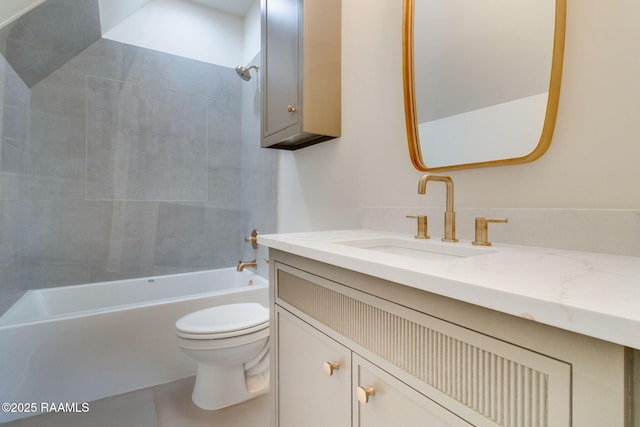 full bathroom with tiled shower / bath combo, vanity, and toilet