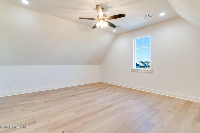 bonus room with ceiling fan, lofted ceiling, and light hardwood / wood-style floors