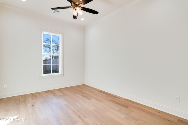 unfurnished room with ceiling fan, ornamental molding, and light hardwood / wood-style flooring