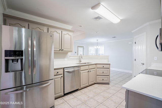 kitchen featuring sink, light tile patterned flooring, ornamental molding, and appliances with stainless steel finishes