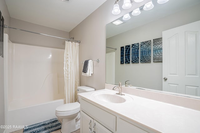 full bathroom with vanity, toilet, and shower / tub combo with curtain