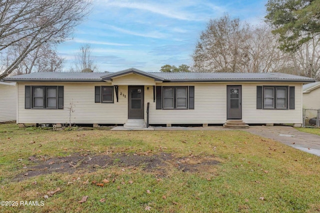 ranch-style home with a front yard