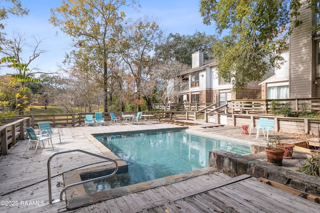 view of pool with a deck