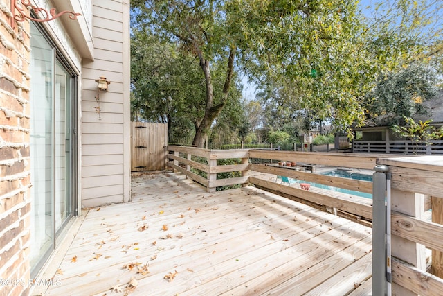 deck featuring a pool