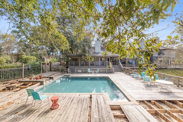 view of pool featuring a wooden deck