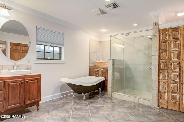 bathroom with crown molding, separate shower and tub, vanity, and tile patterned floors