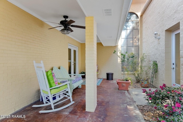 view of patio / terrace with french doors and ceiling fan