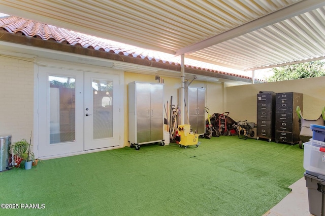 exterior space featuring mail boxes and french doors